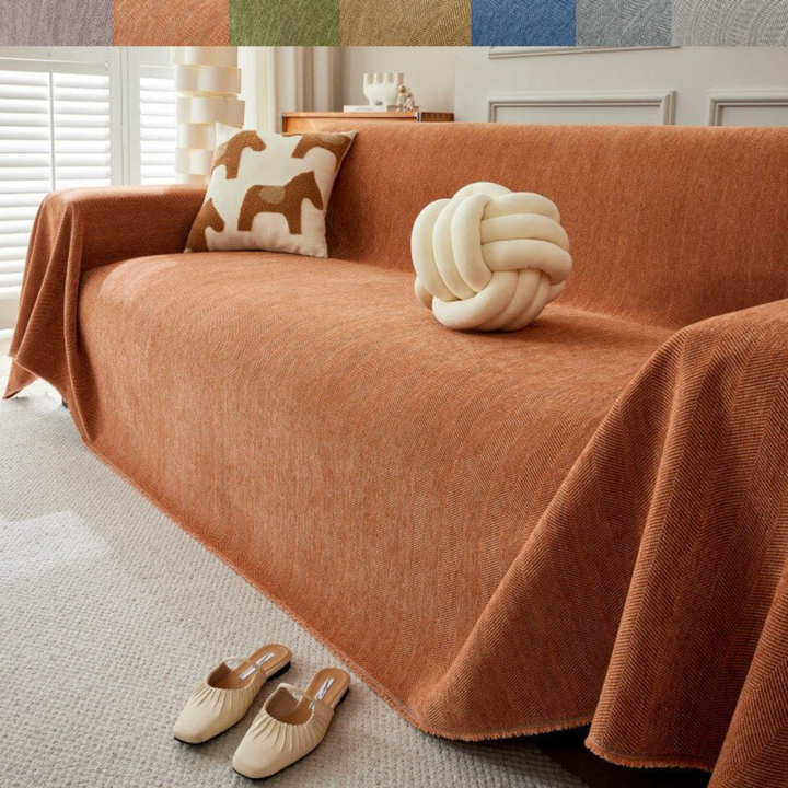 Contemporary stretch sofa cover with geometric design, perfect for sectional and pet owners