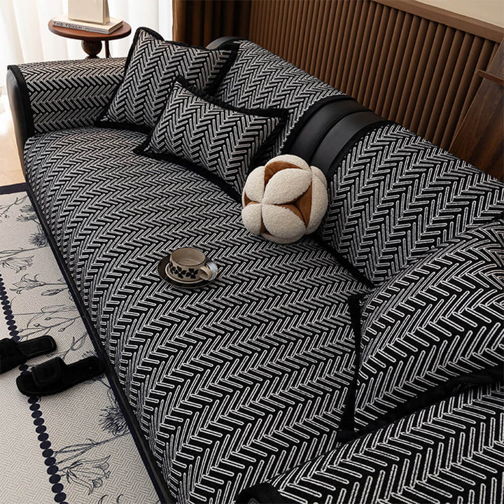 Soft-touch chenille couch cover with elegant herringbone pattern, pet-friendly protection