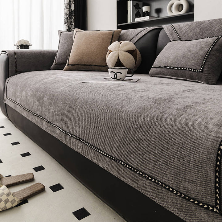 Modern jacquard chenille couch cover in a stylish grey on a three-seater sofa, non-slip design, pet-friendly