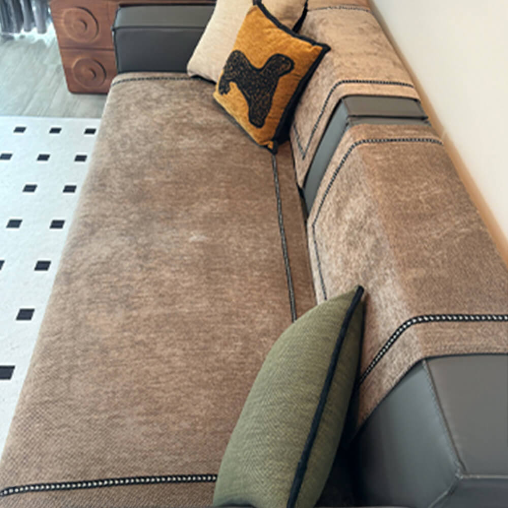 Chenille couch cover in a rich brown with a subtle jacquard pattern, offering durable and non-slip furniture protection