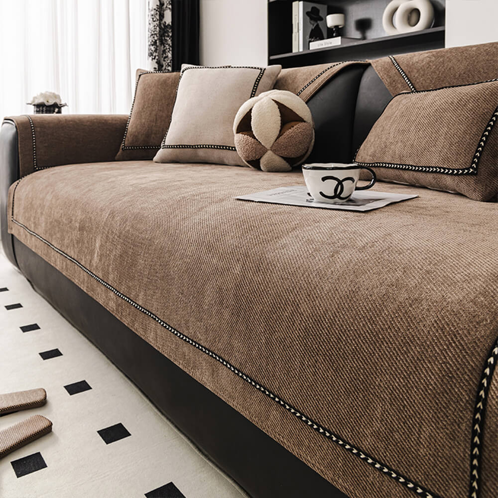 Non-slip chenille couch cover draped over a sectional sofa, showcasing its full coverage and furniture protection