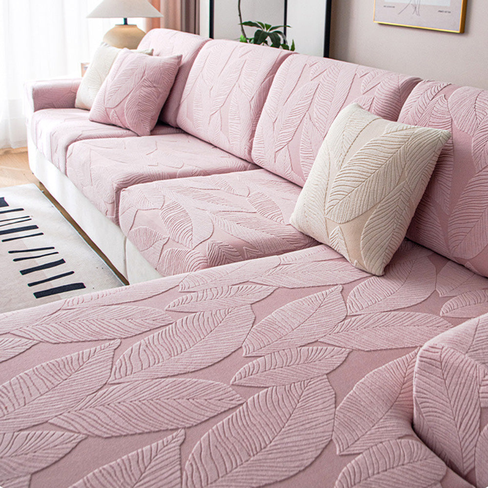 Transform your living space with this modern leaf jacquard sofa cover, water-repellent and pet-proof
