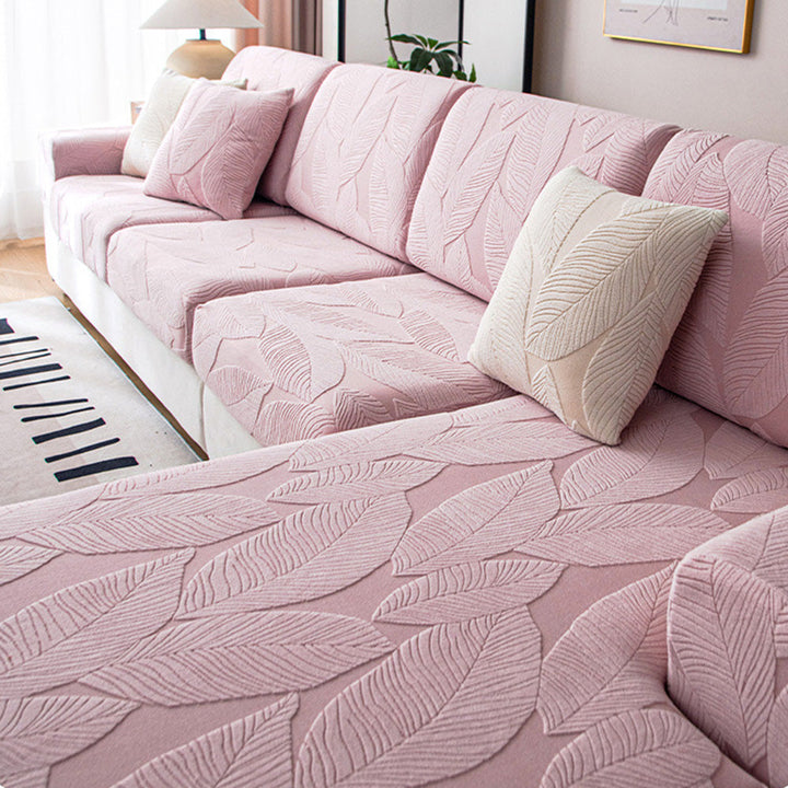 Transform your living space with this modern leaf jacquard sofa cover, water-repellent and pet-proof