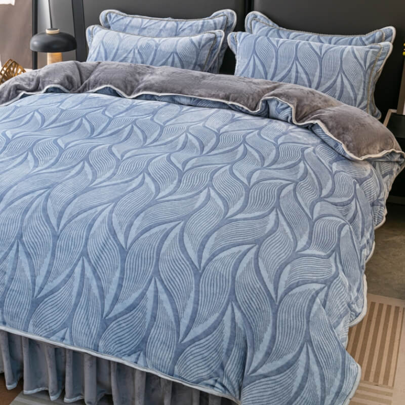 Modern leaf pattern velvet bedding set with duvet cover, skirt, pillowcases. Soft bedroom decor.