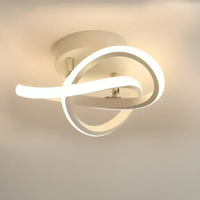 Black LED ceiling lamp with unique dual ring design. Modern, decorative, and energy-efficient lighting for homes.