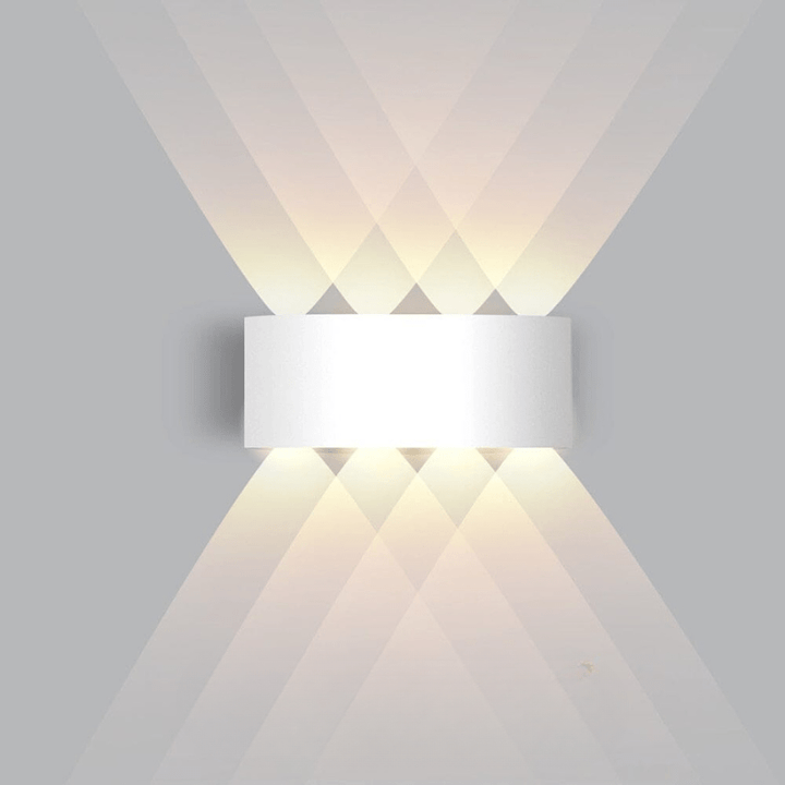 Energy-efficient LED outdoor wall sconce, sleek design for modern home and garden lighting.
