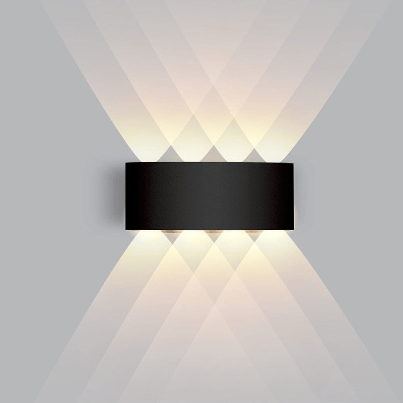Wall-mounted LED outdoor light, modern, durable, and energy-saving for various exteriors.