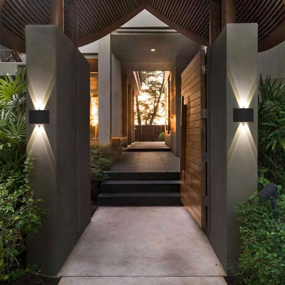 Durable wall-mounted LED light, ideal for energy-efficient driveway & home exterior illumination.
