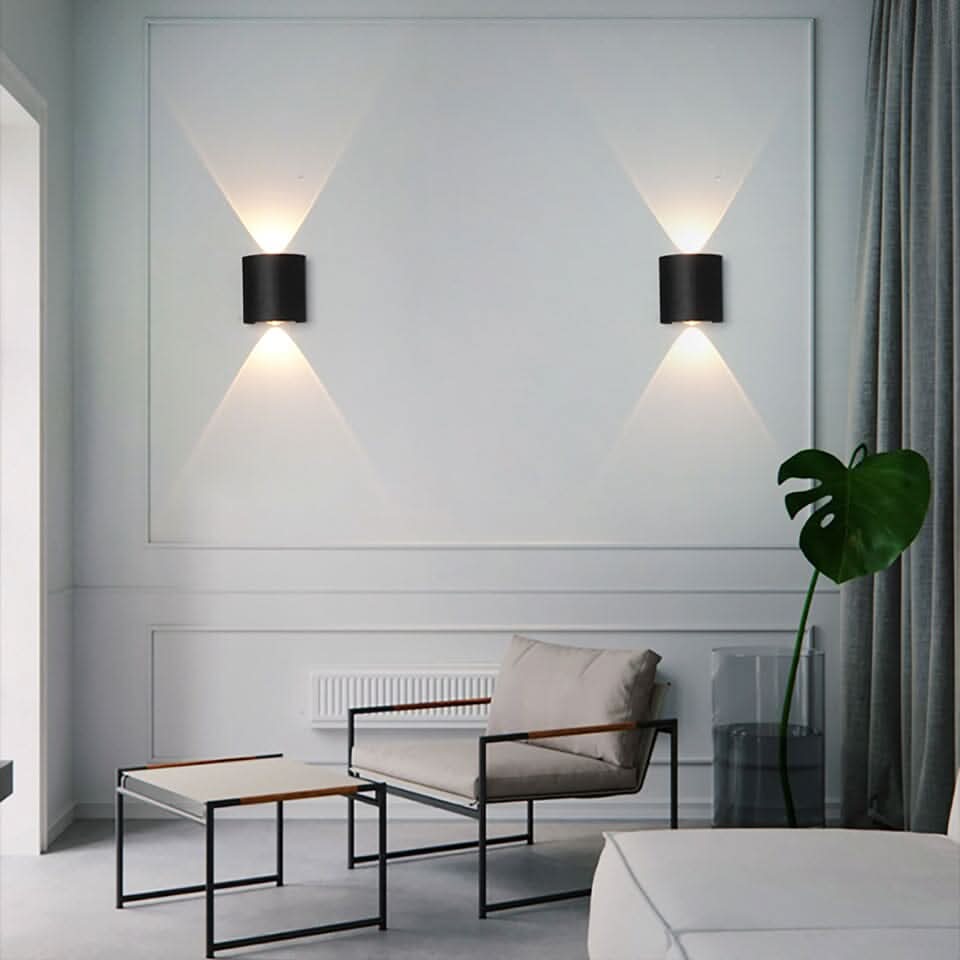 Contemporary outdoor LED wall light, enhances garden lighting with a modern, sleek look.