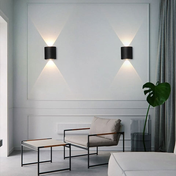 Contemporary outdoor LED wall light, enhances garden lighting with a modern, sleek look.