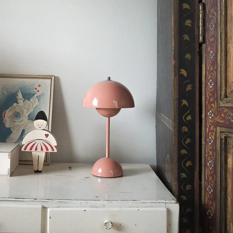 Functional LED table lamp featuring touch activation and dimming for comfortable ambient light.