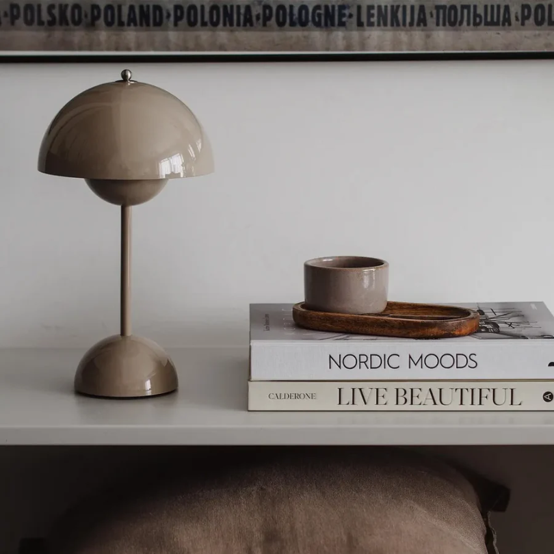 Sleek modern LED table lamp, touch-dimmable, adds stylish lighting to your home decor.