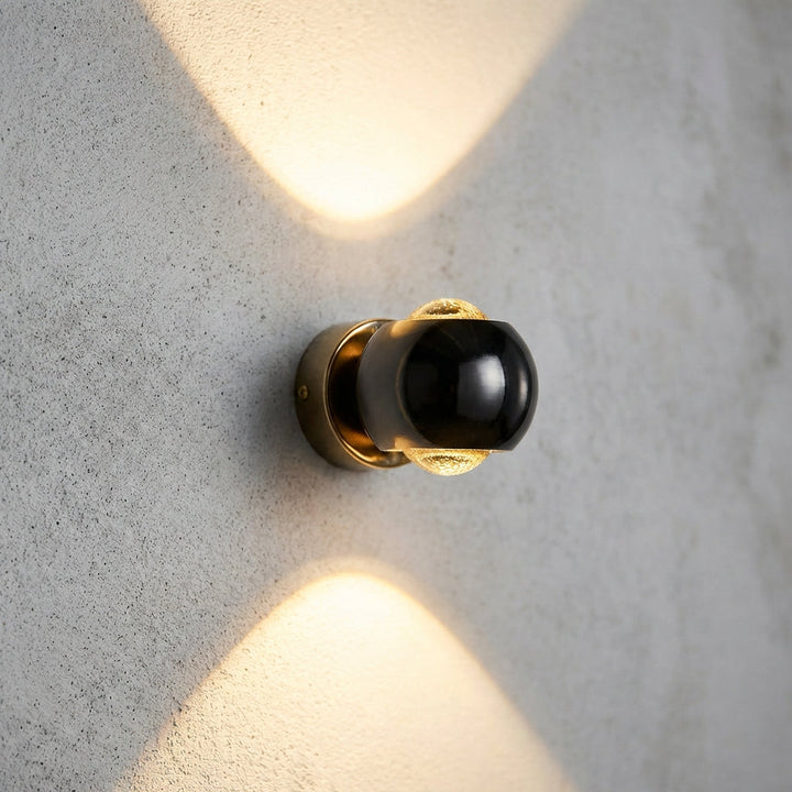 Modern LED wall sconce, Glintara adjustable decorative lighting fixture, warm white, for contemporary home decor.