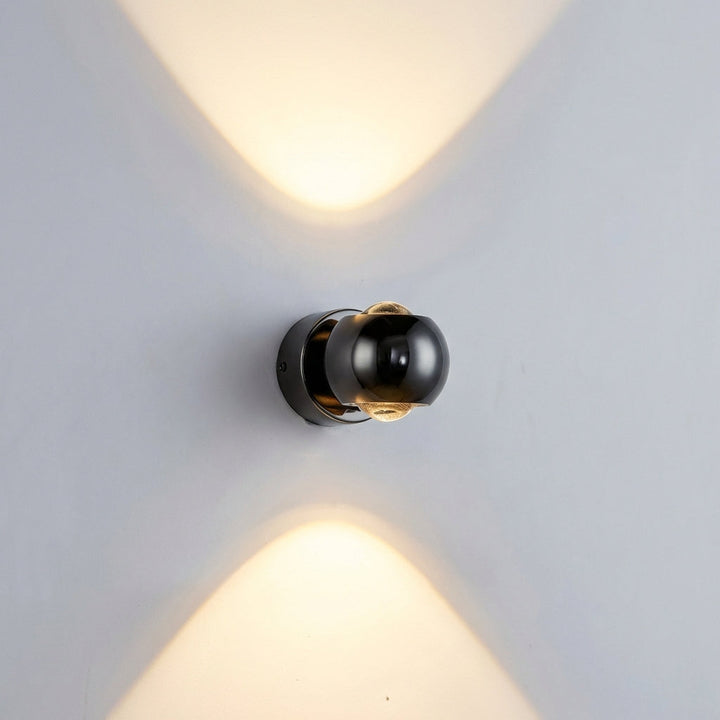 Sleek Glintara modern LED wall light, adjustable for ambient lighting, space-saving decorative fixture.