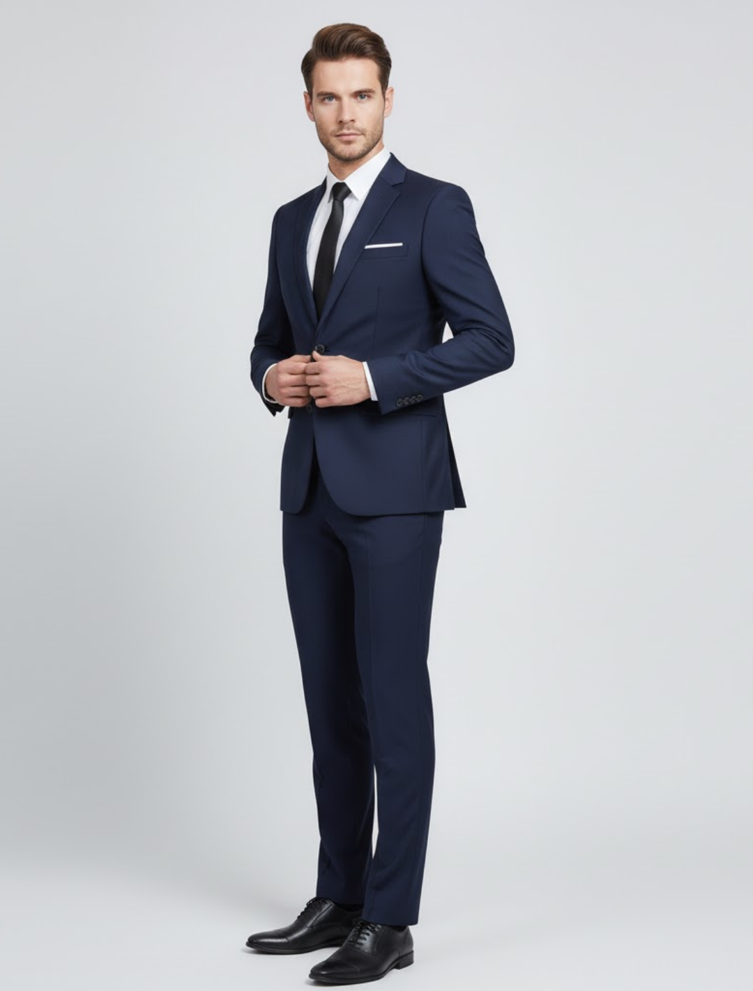 Modern men's dark blue slim-fit two-piece business suit. Professional formal wear, ideal for events.