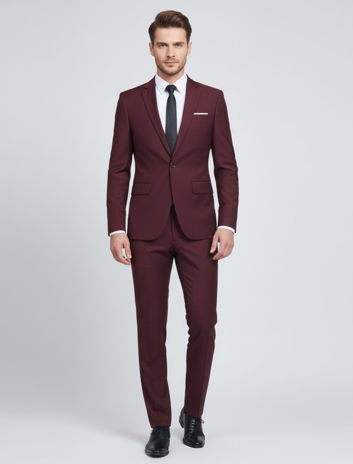 Stylish men's modern two-piece suit. Slim-fit blazer & trousers in dark blue, bordeaux, or black for professionals.