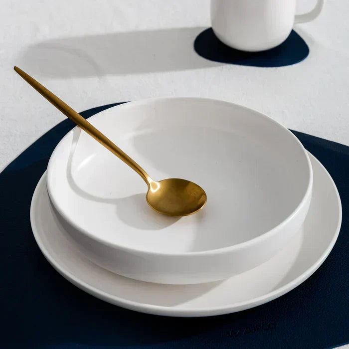 Sleek modern flatware, enhancing any minimalist dining experience. PureSet cutlery set.