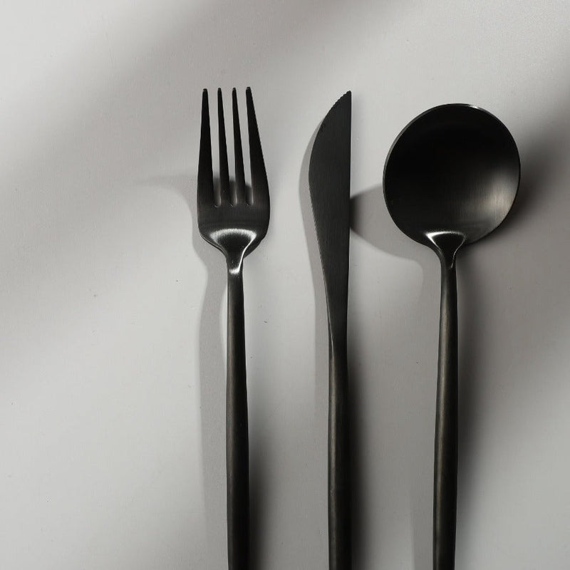 Matte black dining set, sleek, durable, and sophisticated. Modern kitchen flatware.