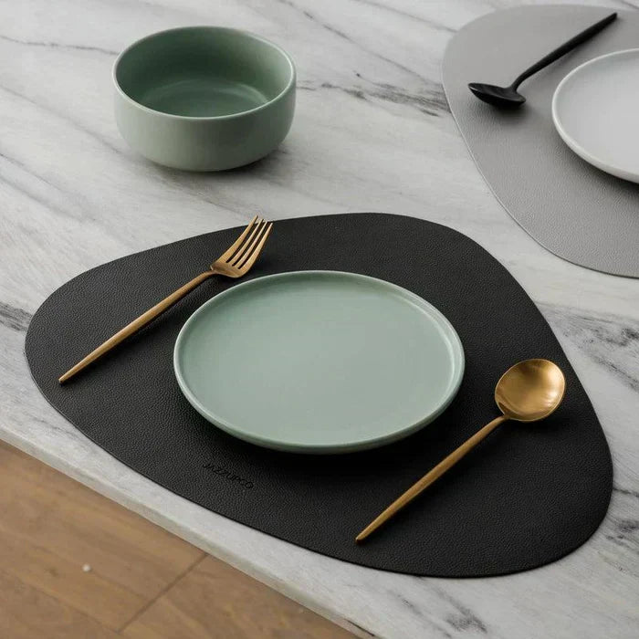Matte black modern flatware for contemporary table settings. Sleek kitchen essential.
