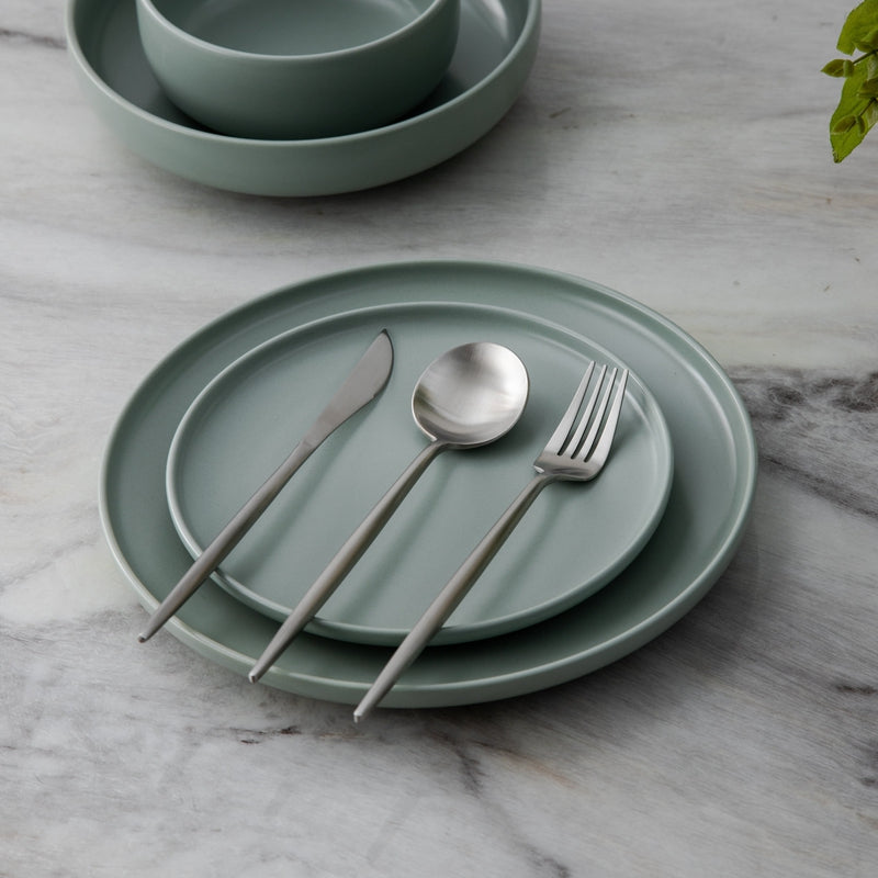 Gold cutlery set, adding elegance to any meal or celebration. Modern flatware.