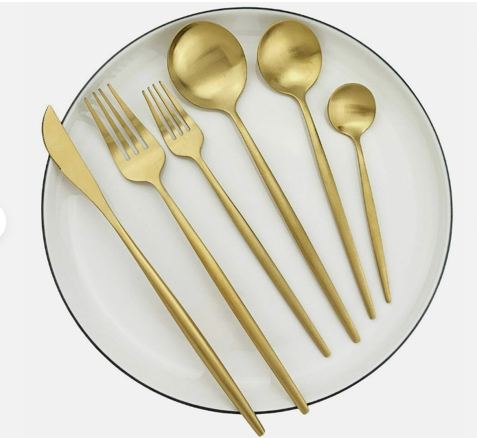 Black minimalist silverware, a chic kitchen essential. Matte finish modern cutlery.