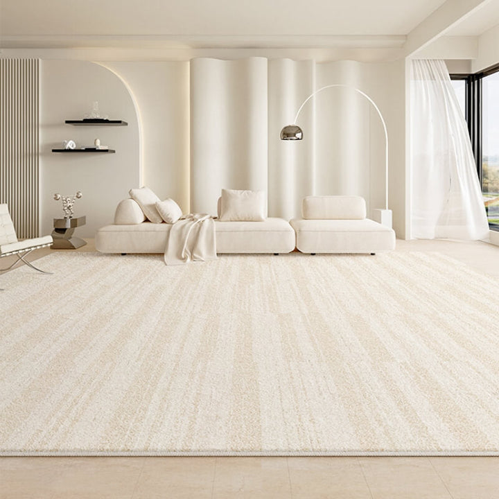 View of a modern living room featuring a plush faux cashmere area rug & home decor
