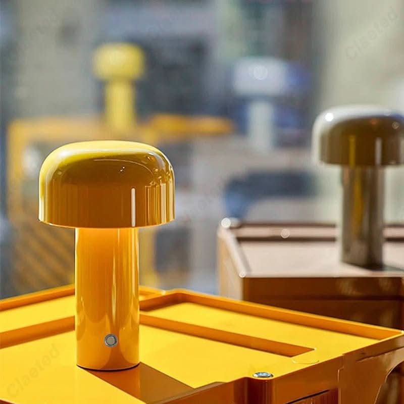 Modern portable USB table lamp, sleek design for bedroom, living room, or office lighting.