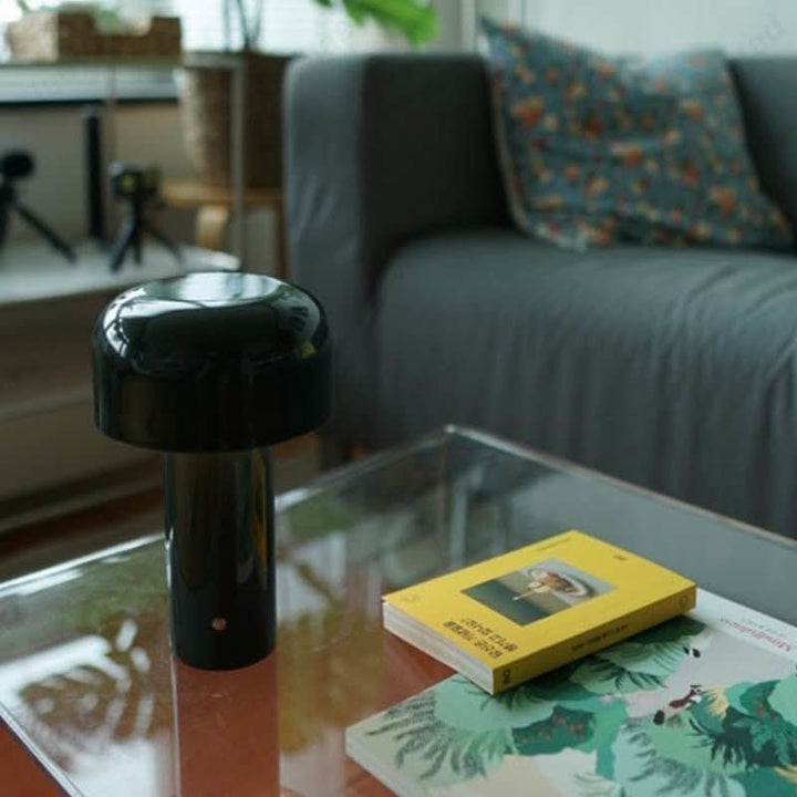Stylish USB touch lamp, a portable nightstand light for ambient bedroom lighting.