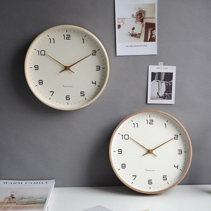 Modern silent wooden wall clock, solid wood for home & office decor, natural minimalist aesthetic.