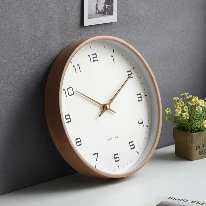 Elegant silent wood wall clock, minimalist design for living room or office decor, timeless natural accent.