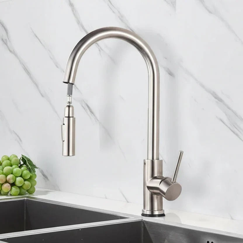 Premium silver kitchen faucet, smart sensor technology & retractable pull-out sprayer for modern kitchens.