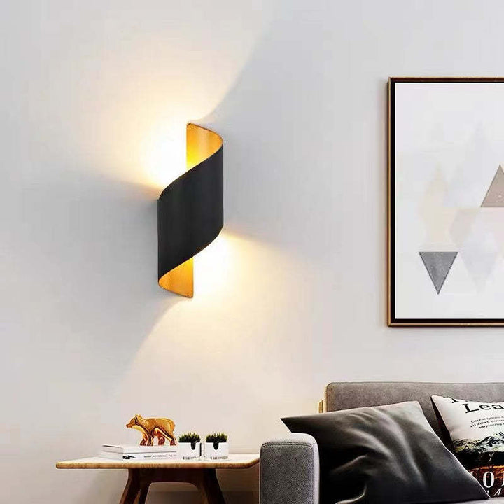 The TwistLight Modern LED Wall Lamp creates a stunning spiral lighting effect on walls.