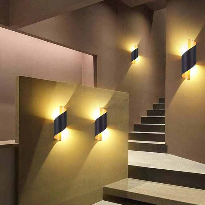 Contemporary Spiral LED Wall Light, sleek design for modern home and commercial spaces.