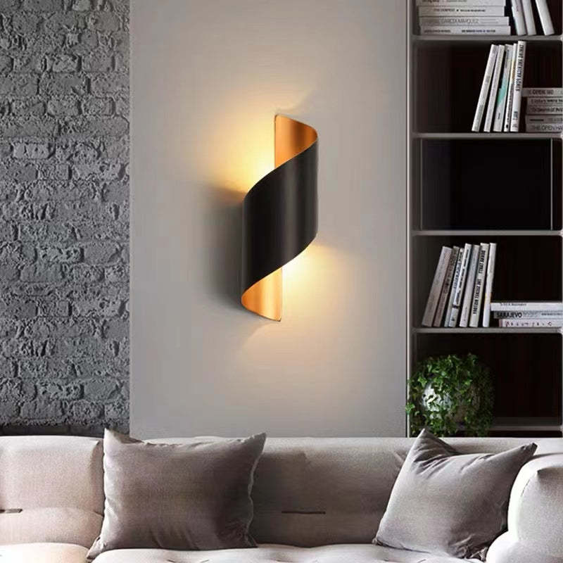 Elegant golden Spiral LED Wall Light, a luxury modern accent for sophisticated interiors.