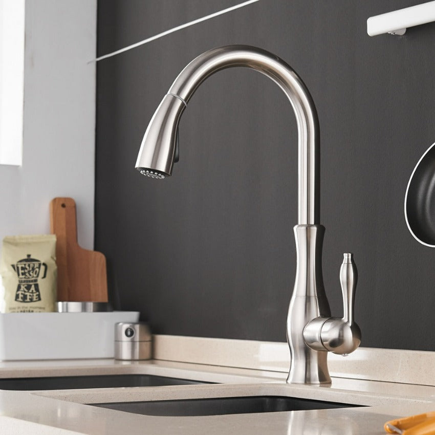 Sleek pull-out kitchen faucet (FlexFlow), stainless steel. A modern retractable tap for kitchen sinks.