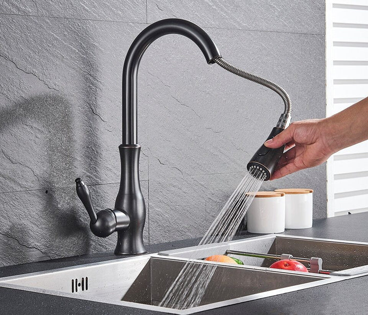 Black modern pull-out kitchen faucet, FlexFlow. Stylish retractable tap for easy kitchen sink cleaning.