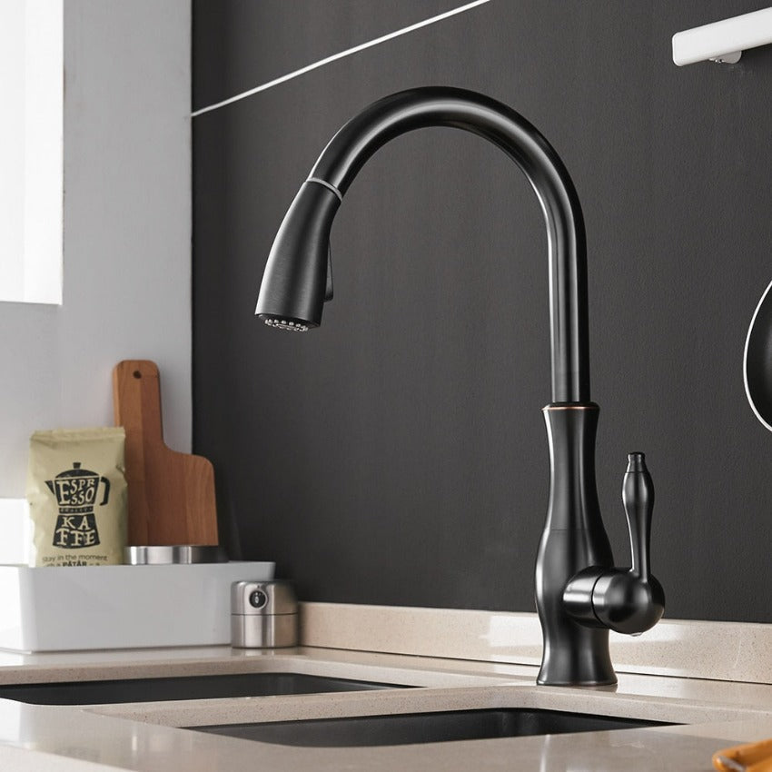 Elegant gold pull-out kitchen faucet for modern kitchens. FlexFlow retractable tap enhances home improvement.
