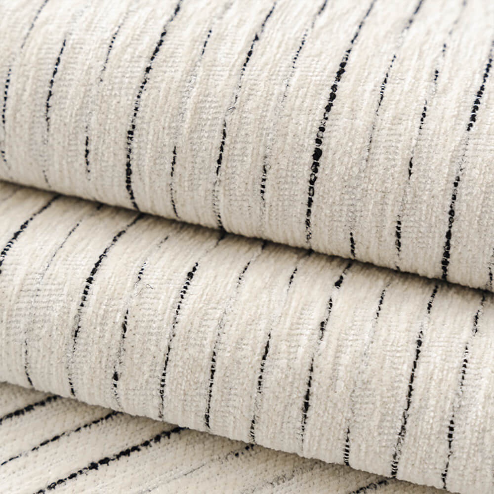Packaging of the modern striped chenille couch cover, ready for sofa protection