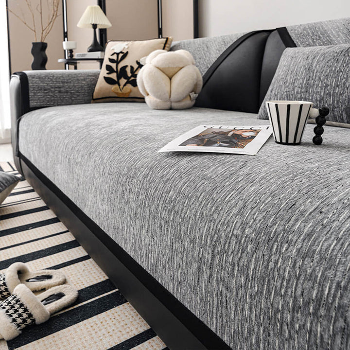 Close-up of modern striped chenille fabric on a couch cover, showcasing texture and pattern
