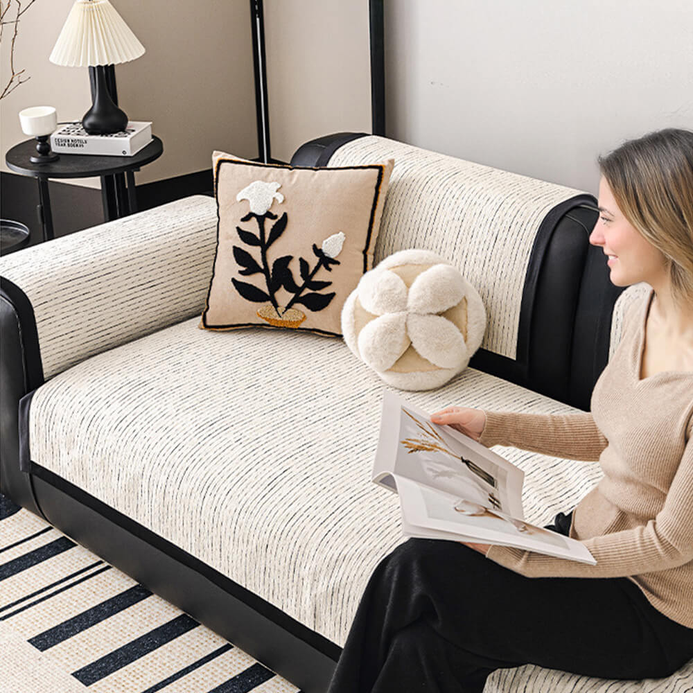 Zoomed-in image of the durable chenille material of a striped couch protector