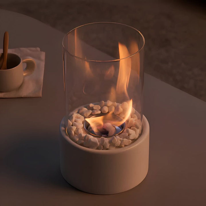 Sleek portable tabletop fire, clean-burning for indoor or outdoor modern decor, adds instant ambiance.