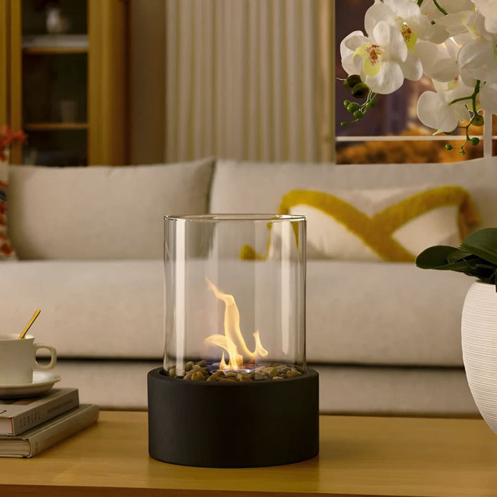 Decorative modern tabletop fireplace, a smoke-free bioethanol burner for a warm, elegant home ambiance.