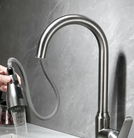 Contemporary kitchen faucet with touch control and versatile pull-out spray, available in various modern finishes.