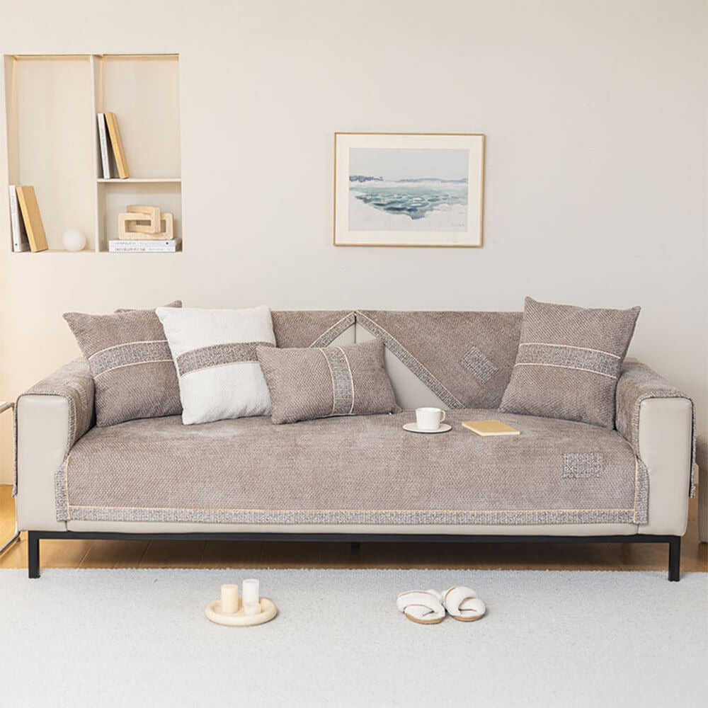 Modern tweed chenille sofa cover, anti-slip & pet-friendly, protecting a living room couch