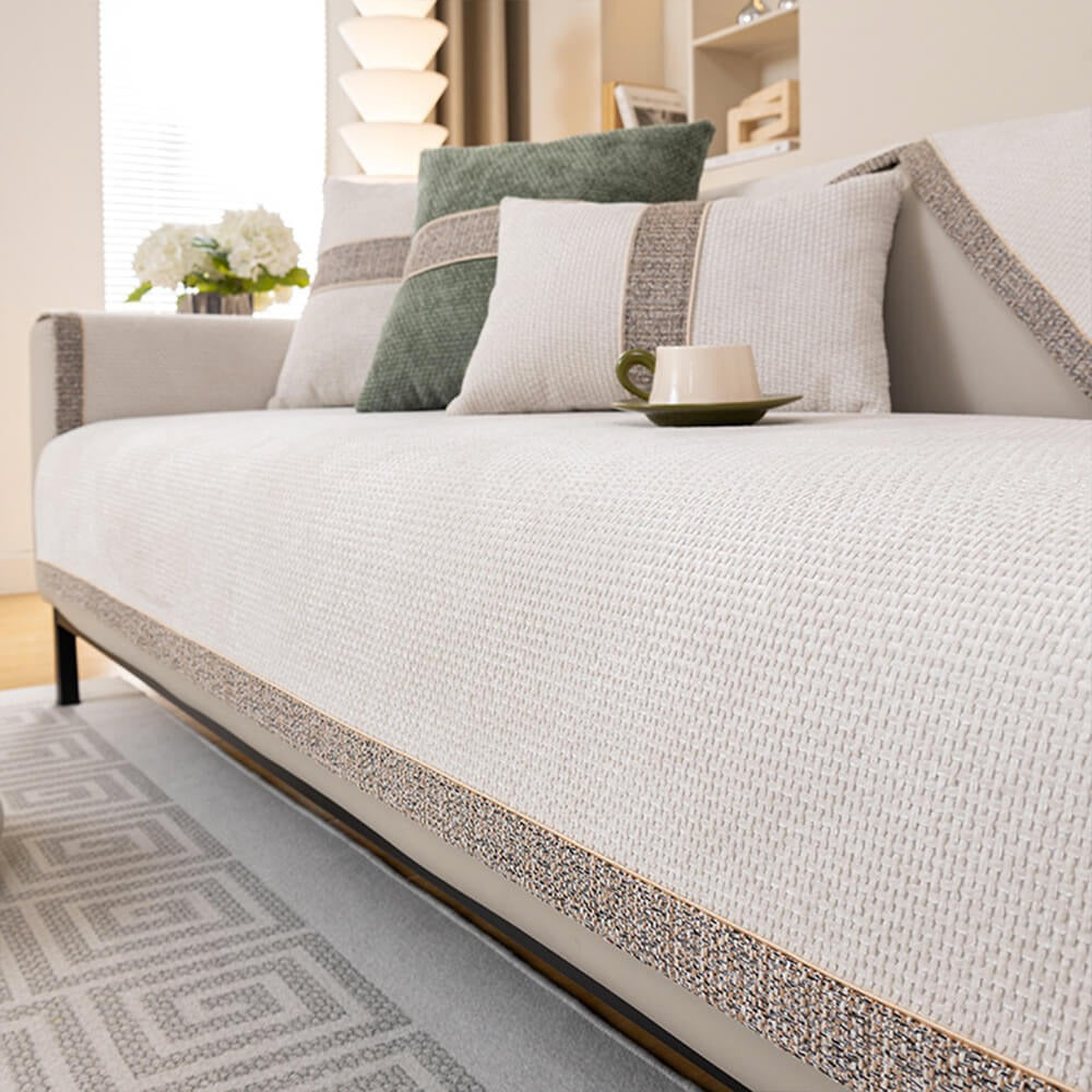 Pet-friendly chenille sofa cover in modern tweed design, shown on a sectional