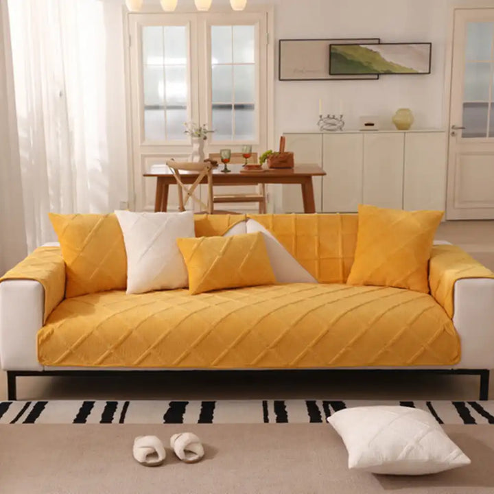 Corner detail of a modern home sofa protector, emphasizing its high-quality velvet plush material