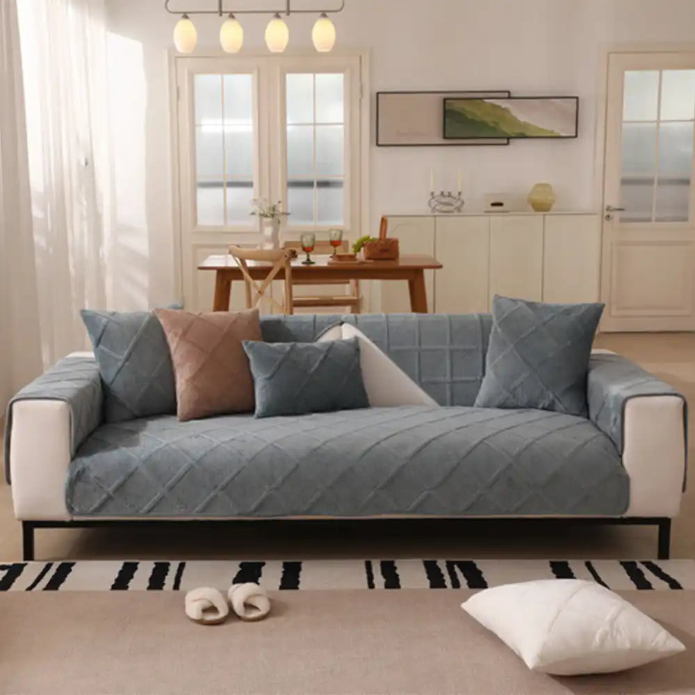 Soft touch sofa protector in a contemporary living room, blending seamlessly with modern decor