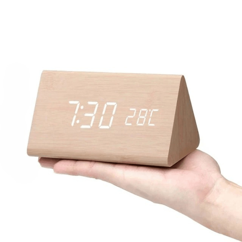 Sophisticated LED wooden clock, voice-controlled features for a smart and stylish home.