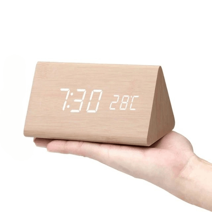 Sophisticated LED wooden clock, voice-controlled features for a smart and stylish home.