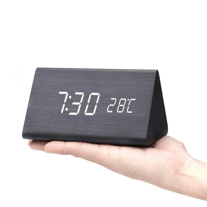 Functional wooden LED desk clock, voice-activated time display & alarm, fits modern decor.